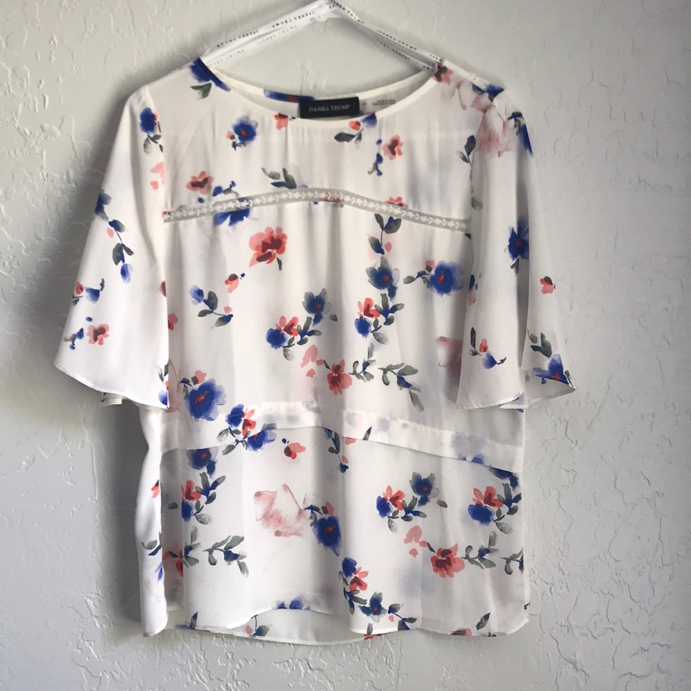 Ivanka Trump short sleeved blouse.